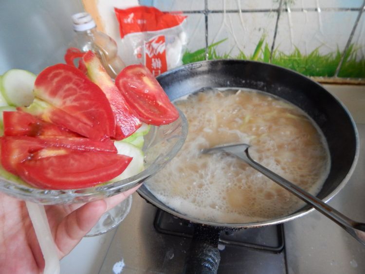 西红柿肉丝煮年糕步骤16